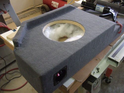 Custom subwoofer enclosure - bottom view with carpet and stuffed with polyfill